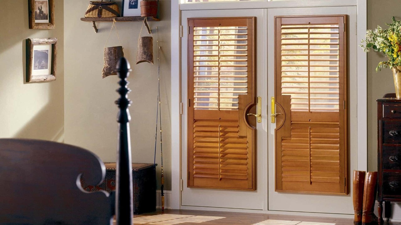 Brown Plantation shutters installed in a Greenville, SC home on french doors